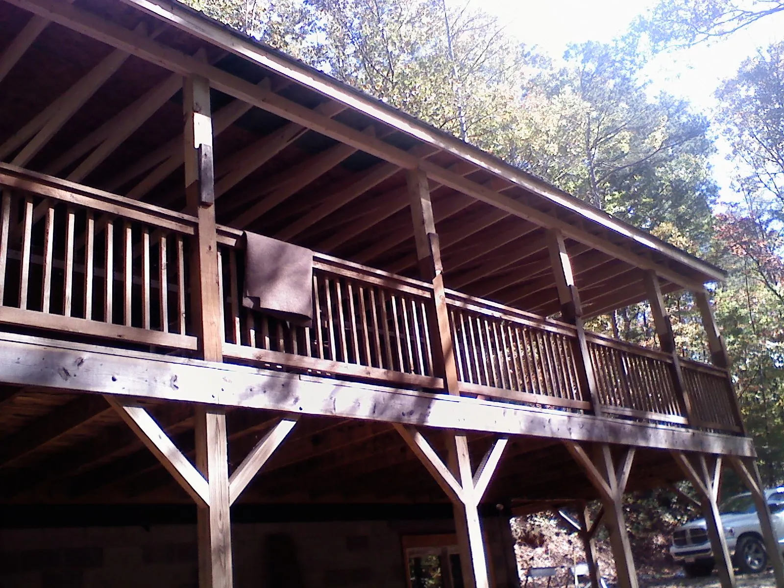 Timber framing under a new elevated porch and deck — Roof Leak Repair in Greens Fork by Roofing Brothers